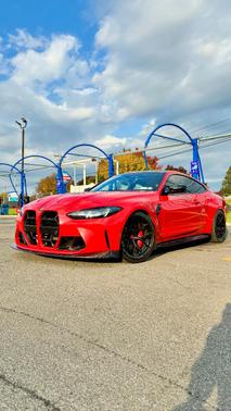 Red 2025 BMW M4 Competition xDrive