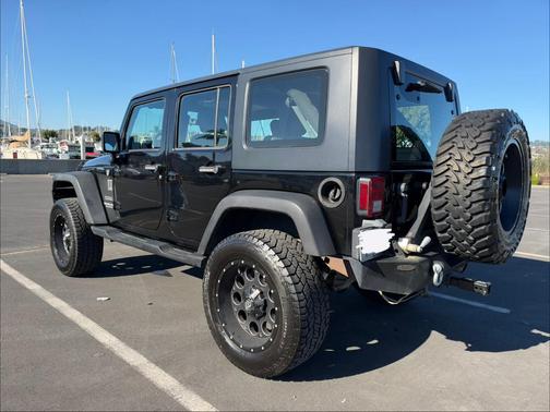 Black 2010 Jeep Wrangler Unlimited Sport