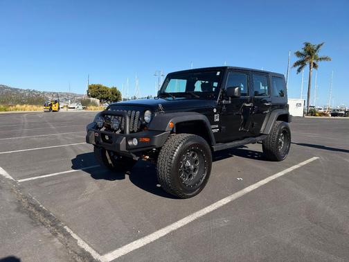 Black 2010 Jeep Wrangler Unlimited Sport