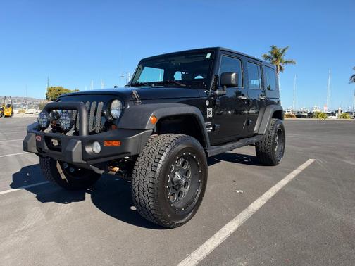 Black 2010 Jeep Wrangler Unlimited Sport