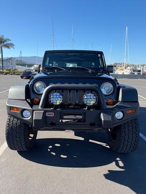 Black 2010 Jeep Wrangler Unlimited Sport