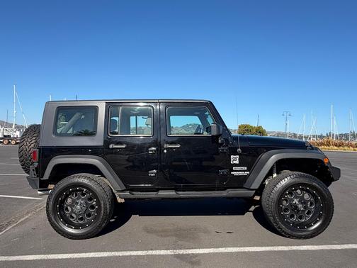 Black 2010 Jeep Wrangler Unlimited Sport