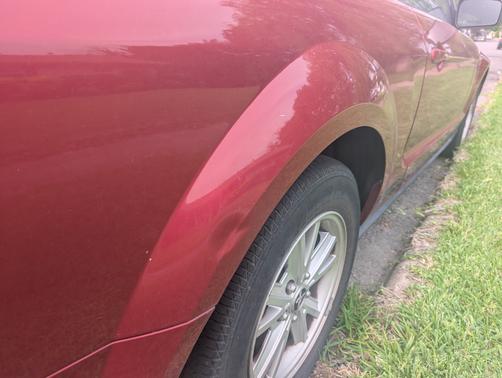 Red 2005 Ford Mustang Deluxe