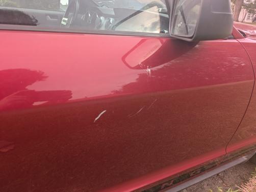 Red 2005 Ford Mustang Deluxe
