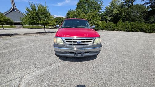 Red 2001 Ford F-150 XLT SuperCab