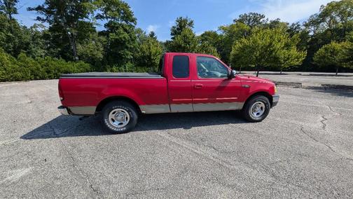 Red 2001 Ford F-150 XLT SuperCab