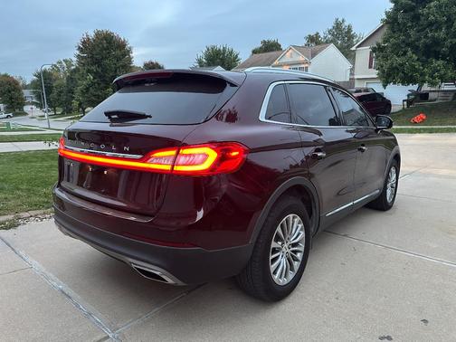 Red 2017 Lincoln MKX Select