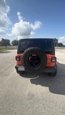 Orange 2023 Jeep Wrangler Sport S