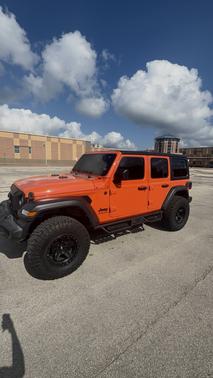 Orange 2023 Jeep Wrangler Sport S