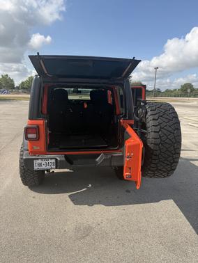 Orange 2023 Jeep Wrangler Sport S