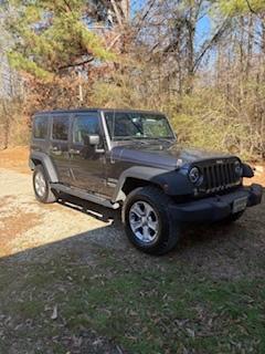Gray 2016 Jeep Wrangler Unlimited Sport