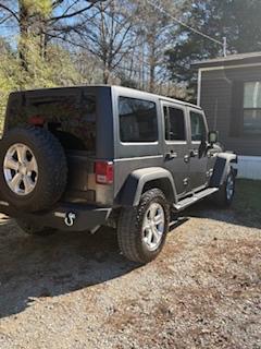Gray 2016 Jeep Wrangler Unlimited Sport
