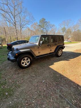 Gray 2016 Jeep Wrangler Unlimited Sport