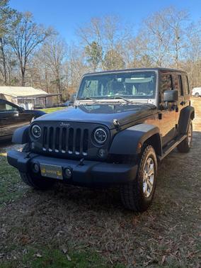 Gray 2016 Jeep Wrangler Unlimited Sport