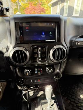 Silver 2014 Jeep Wrangler Unlimited Sport