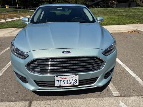 Blue 2014 Ford Fusion Hybrid SE
