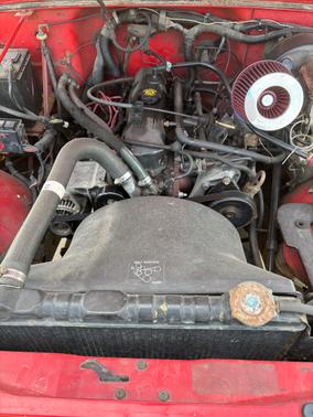 Red 1995 Jeep Wrangler S
