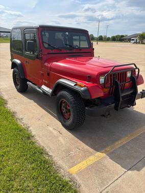 Red 1995 Jeep Wrangler S