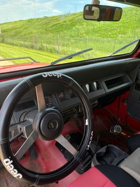 Red 1995 Jeep Wrangler S
