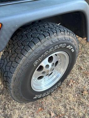 Black 1999 Jeep Wrangler Sport