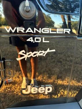 Black 1999 Jeep Wrangler Sport