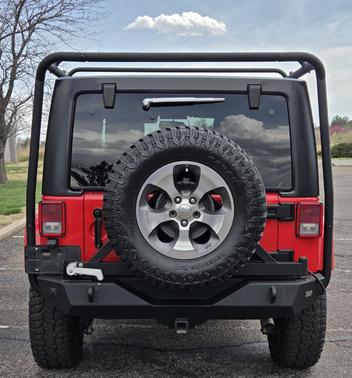 Red 2017 Jeep Wrangler Unlimited Sahara