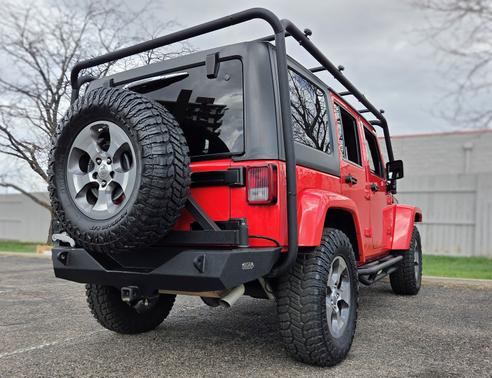 Red 2017 Jeep Wrangler Unlimited Sahara