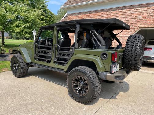 Green 2016 Jeep Wrangler Unlimited Sahara