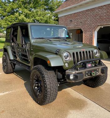 Green 2016 Jeep Wrangler Unlimited Sahara