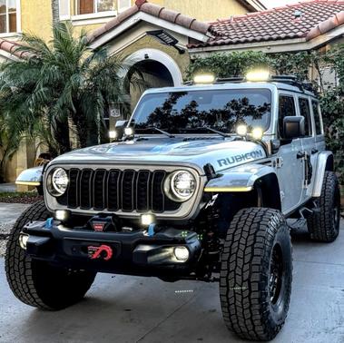 Silver 2024 Jeep Wrangler 4xe Rubicon X