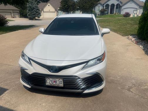 White 2023 Toyota Camry Hybrid XLE