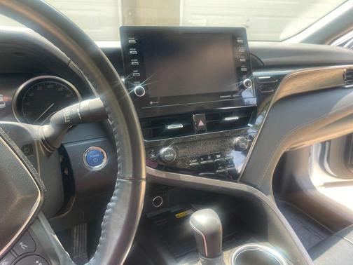 White 2023 Toyota Camry Hybrid XLE