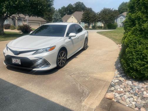 White 2023 Toyota Camry Hybrid XLE