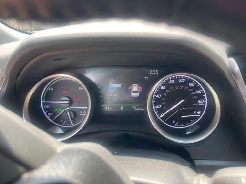 White 2023 Toyota Camry Hybrid XLE