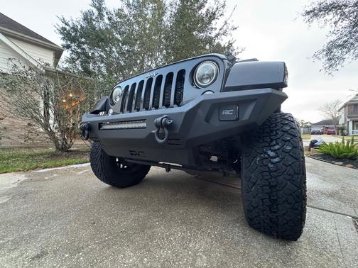 Black 2016 Jeep Wrangler Unlimited Sport