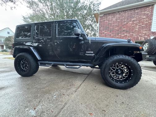 Black 2016 Jeep Wrangler Unlimited Sport