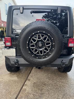 Black 2016 Jeep Wrangler Unlimited Sport