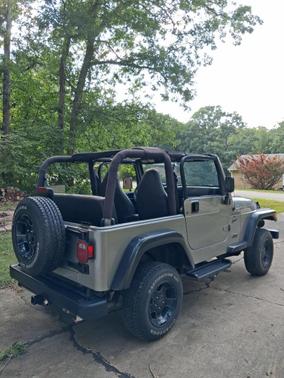 Beige 2000 Jeep Wrangler Sport