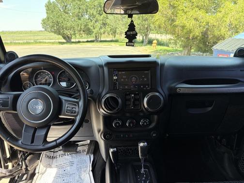 Black 2012 Jeep Wrangler Unlimited Sport