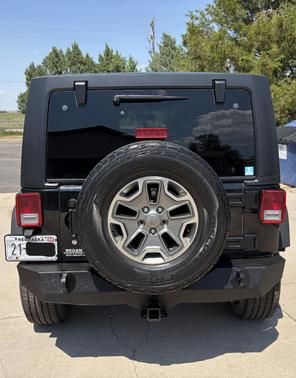 Black 2012 Jeep Wrangler Unlimited Sport