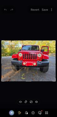 Red 2013 Jeep Wrangler Unlimited Sahara