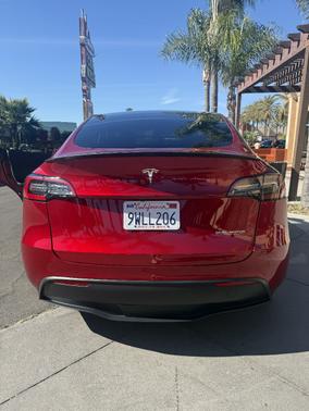 Red 2024 Tesla Model Y Performance