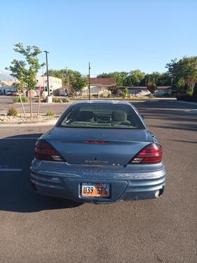 Blue 1999 Pontiac Grand Am SE 1