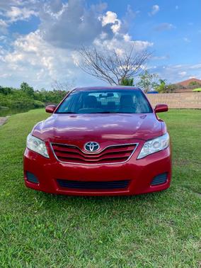 Red 2010 Toyota Camry LE