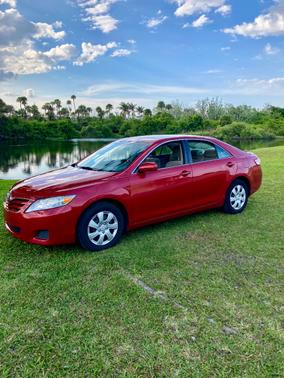 Red 2010 Toyota Camry LE