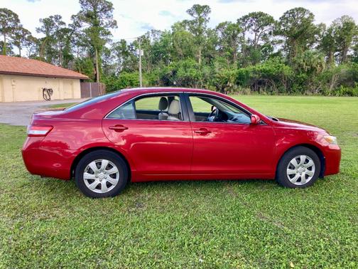 Red 2010 Toyota Camry LE