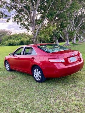 Red 2010 Toyota Camry LE