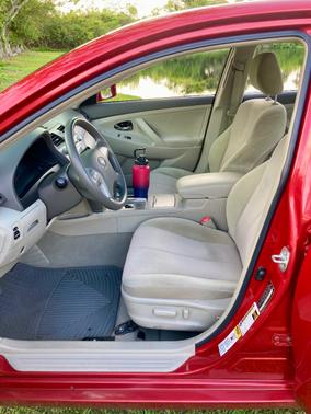 Red 2010 Toyota Camry LE