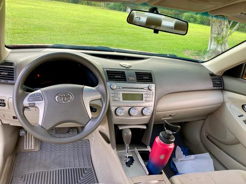 Red 2010 Toyota Camry LE
