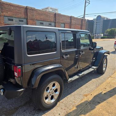 Black 2015 Jeep Wrangler Unlimited Sahara